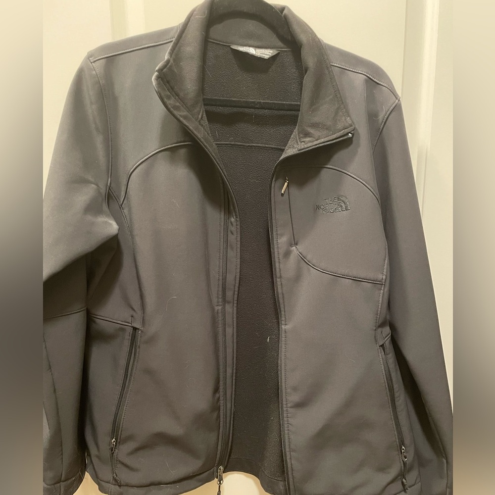 New without tags. The Northface water resistant jacket with fleece lining.